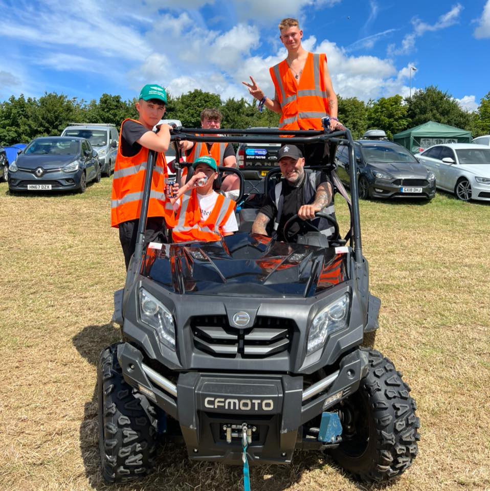 Staff members on UTV ready to assist campers around the site