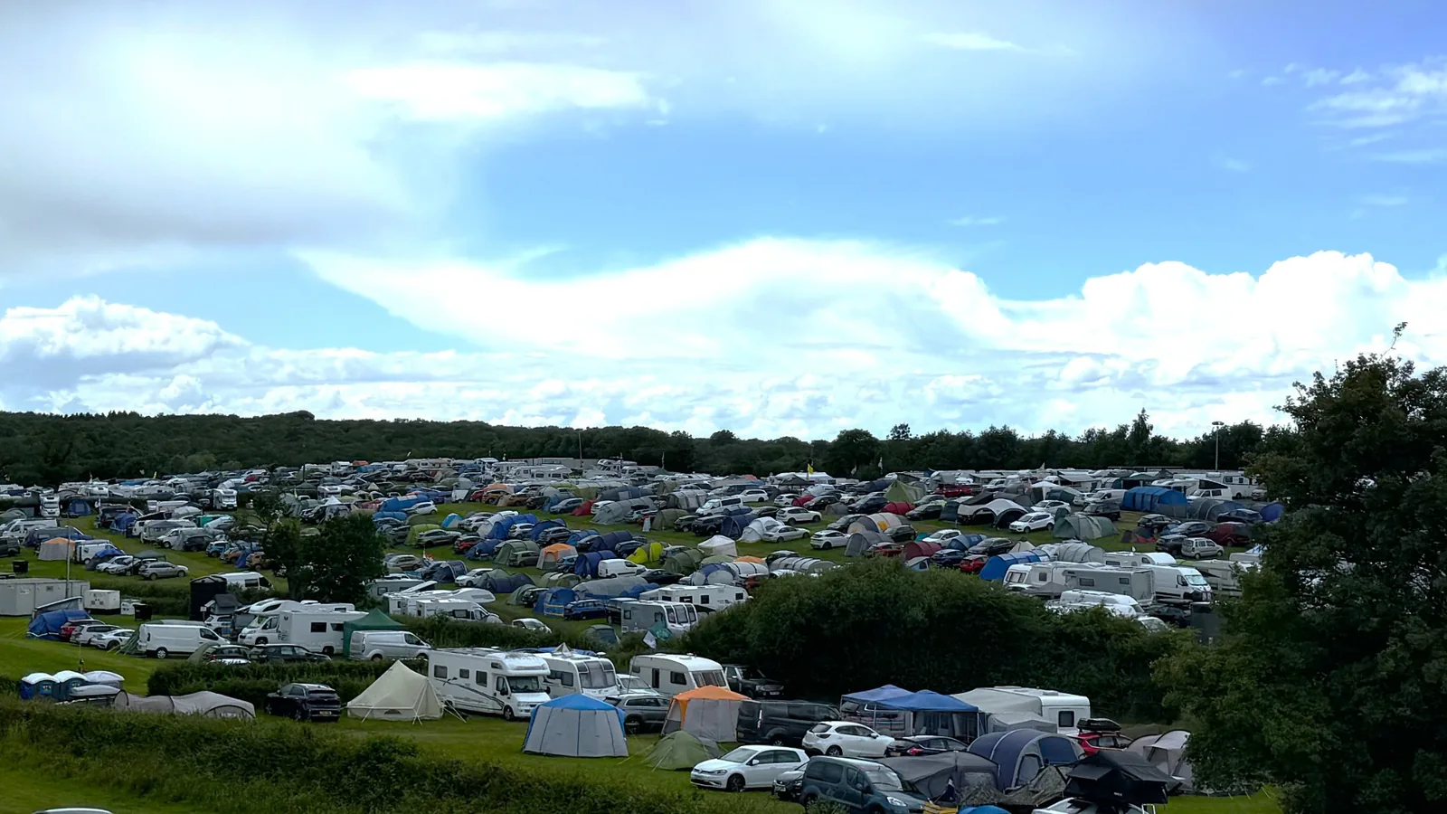 General camping pitch with tents at Cartmel Fields