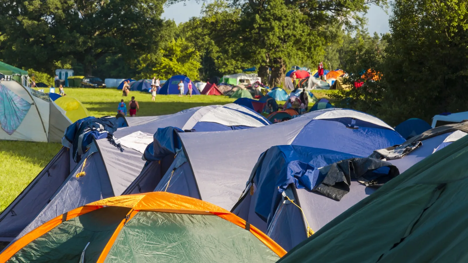 Campers enjoying the atmosphere at Cartmel Fields